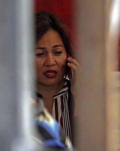 FISCAL CASTRO ARRESTED/MARCH 08,2016:Fiscal Mary Ann Castro seen talking to her phone inside Cebu City Medical Center after she was arrested by RSOG 7 after they ransack the office.(CDN PHOTO/LITO TECSON)