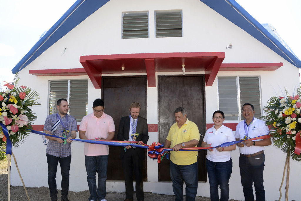 (L-R) Simoné Giovetti - President, Cités-Unies France;Hon. Celestino "Tining" Martinez III; Laurent Le Godec - First Counselor, Republic of France to the Philippines; Hon. Celestino "Junie" Martinez Jr. - Mayor, City of Bogo; Mr. Ana Cosolluela - Corporate Communications Manager, Total Philippines; Charlito S. Ayco - CEO, Habitat for Humanity Philippines. (CDN PHOTO.CHRISTIAN MANINGO)