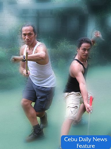 Ronaldo Vicente Rubio shows his martial arts skills with his friend in Cebu. (CONTIBUTED PHOTO)