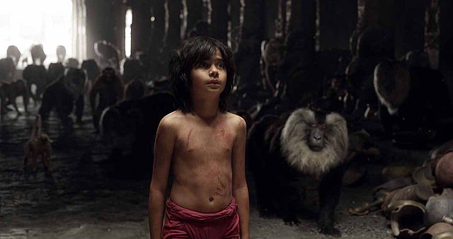 Neel Sethi as Mowgli in a scene from “The Jungle Book”