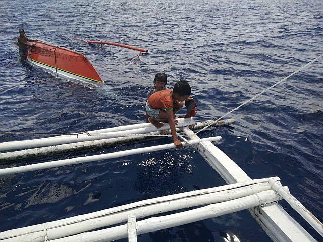 Roy Monato in his 30s of Sitio Lipata was rescued together with his children, a boy between 8 and 9 years old and a girl between 6 and 7 years old. Their boat capsized in between Kawit in mainland Medellin and Gibitngil Island. (CONTRIBUTED PHOTO/NIÑACHLEO DIANNE SAPLAD)