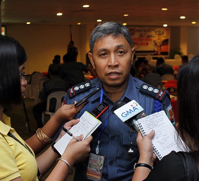 ITP AND GPS PATROL PLANNING OF POLICE/DEC.12,2012:Provincial Police Director Snr Supt. Patrocinio Commendador Jr answer question from the media regarding the ITP-GPS patrol planning at Cebu International Convention Center.(CDN PHOTO/LITO TECSON)