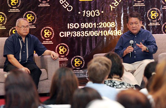 BO-PK mayoral candidate Tomas Osmeña (right) answers questions from business sectors during the Cebu Chamber of Commerce and Industries (CCCI) Mayoralty Forum with Fr. Dionisio Miranda (left) as the moderator. (CDN PHOTO/JUNJIE MENDOZA)