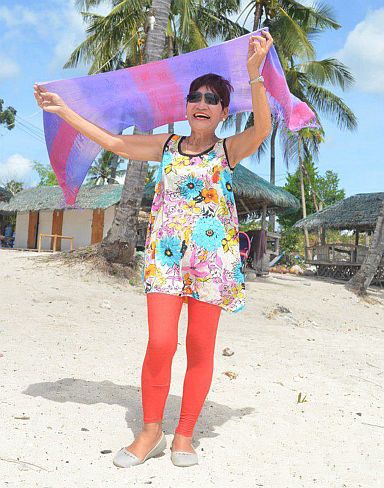 Angie Gica's colorful and positive personality shines, helping her to overcome the challenges that she faced over the decades. (Contributed Photo)