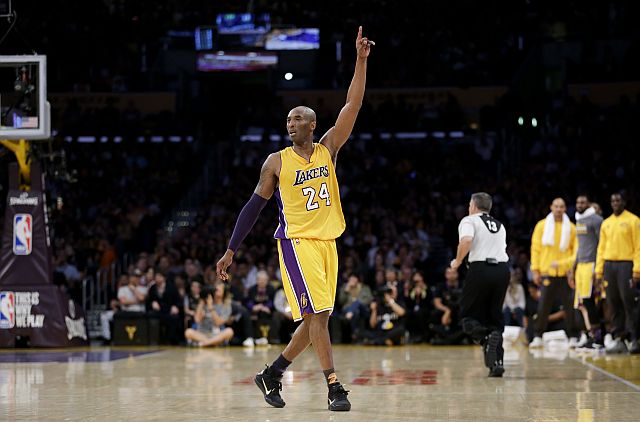 Los Angeles Lakers forward Kobe Bryant gestures during the first half of Bryant's last NBA basketball game, against the Utah Jazz, on Wednesday, April 13, 2016, in Los Angeles. (AP Photo/Jae C. Hong)