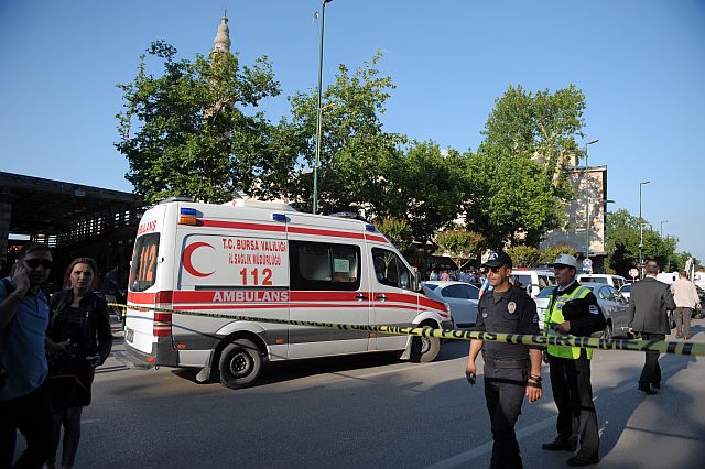 Police officers secure the area after a suicide bomb explosion outside the historical Ulu Cami in Bursa, Turkey, Wednesday, April 27, 2016.  The office of the governor of Bursa said in a statement carried by the state-owned Anadolu Agency that a woman believed to be a suicide bomber blew herself up.(AP) 