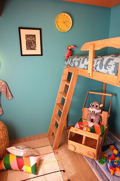 THE CHILDREN’S ROOM in the two-bedroom is done in the colors of Boysen paints at their disposal, with General Bleu (Angel and May’s furniture manufacturing and marketing company) custom pieces.