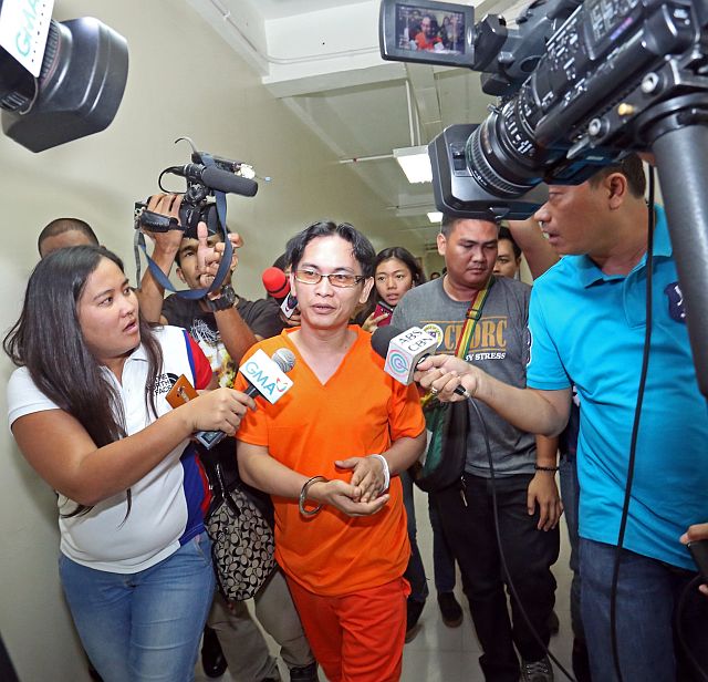 Joavan Fernandez answers question from the media as he was leaving  the court after his conviction for illegal possession of an explosive and of a firearm. (CDN PHOTO/LITO TECSON)