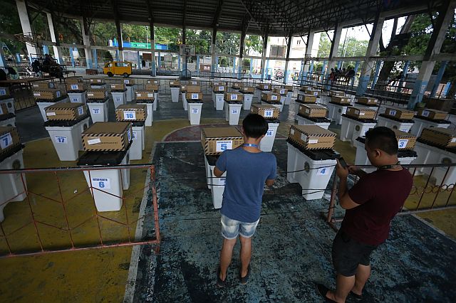 PCOS machine used tomorrow election 2016 were place at Tuburan covered court for safe keeping... (CDN PHOTO/Lito Tecson)