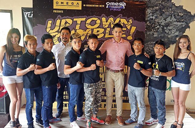 UPTOWN RUMBLE PRESSCON/MAY 25,2016:Pio Paulo Castillo President Omega Pro Sports International (center) pose after their press conference at Mangahan of the Whos Next Pro Boxing series 2 Uptown Rumble these June 11.(CDN PHOTO/LITO TECSON)