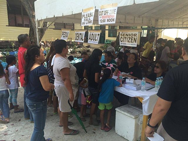 Residents troop to El Pardo Elementary School in Boljoon town to avail of free consultations and other medical services. (CONTRIBUTED)