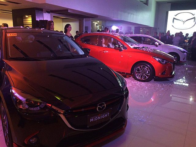 Units of the Mazda 2 Premium Series are displayed at the newly renovated showroom of Mazda Cebu. (CDN PHOTO/BRIAN J. OCHOA)