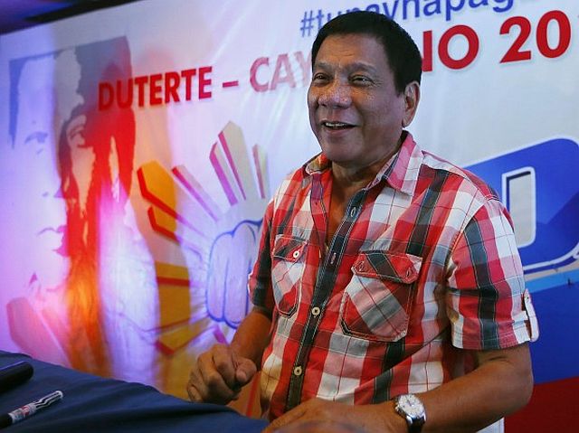 Presumptive president and Davao City Mayor Rodrigo Duterte in a news conference shortly after he voted at his polling precinct at the Daniel R. Aguinaldo National High School in Matina district, Davao City  on Monday, May 9. Duterte was the last to vote among the five presidential hopefuls. (AP Photo)