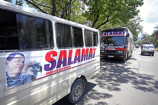 DUTERTE THANKS/MAY 16,2016:A bus of Davao City Mayor Rodrigo Duterte with a words "SALAMAT" THANKS park in Ayala to its supporter these group come from Davao City.(CDN PHOTO/LITO TECSON)