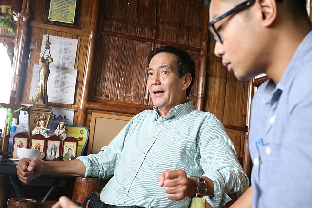 Cebu City Mayor Michael Rama answer question from the media regarding his suspension issue during his press conference in Rama Compound bahay kubo with his son Atty. Mikel Rama (CDN PHOTO/LITO TECSON)