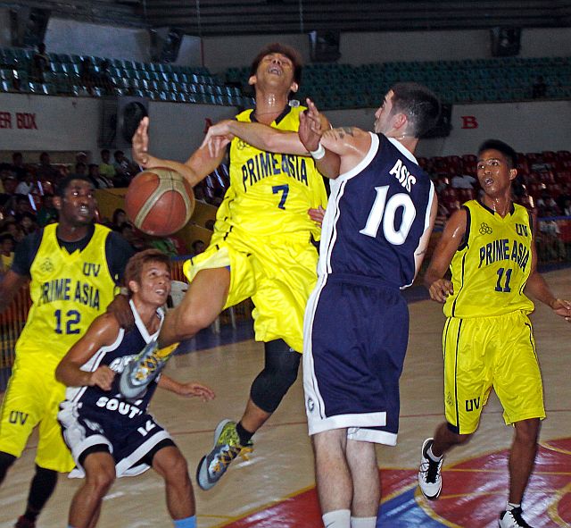Collegiate players from different Cebu schools compete in the 2013 edition of the Cesafi Partner’s Cup. The pre-season tournament returns from a one-year hiatus this May 21. (CDN PHOTO/LITO TECSON) 