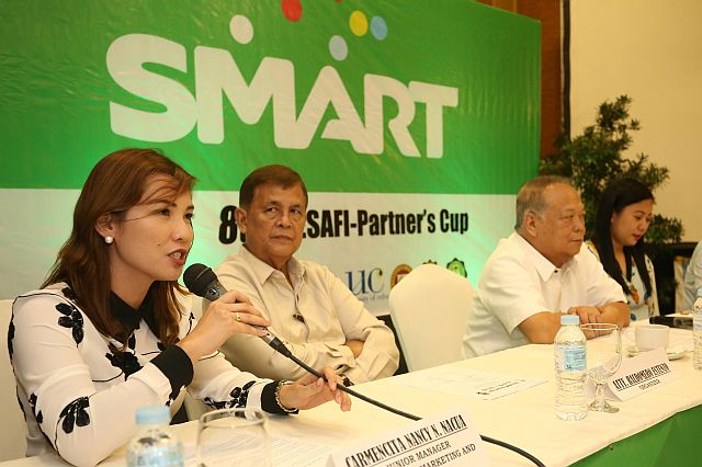 Carmencita Nacua, Smart’s Integrated Marketing and Community Manager, answers a question from the media during a press conference for the 8th Cesafi Partner’s Cup at the Cebu Parklane International Hotel. Joining her are Atty. Baldomero Estenzo, Cesafi Commissioner Felix Tiukinhoy, and Lailane Husain, Area Manager of Smart. (CDN PHOTO/LITO TECSON)