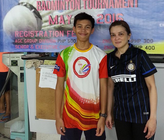 Carl Bernard Bejasa and partner Dr. Karina Tecson Mixed Level E champions. (CDN PHOTO/MARK TONGCO)