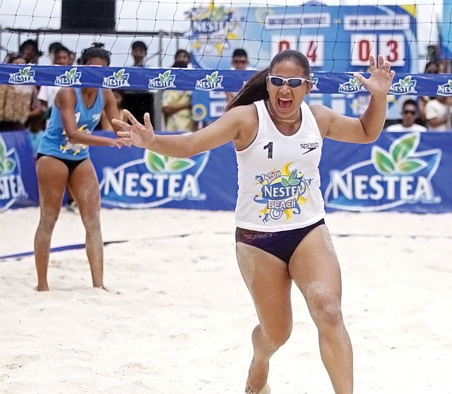 15TH NESTEA BEACH VOLLEY/MARCH 11,2012:Danika Yolanda Gendrauli of SWU shout of joy after their opponent from University of Saint La Salle miss the ball during their game in 15th Nestea Beach Volley at Barangay Saavedra Moalboal HK resorts.SWU win the game.(CDN PHOTO/LITO TECSON)