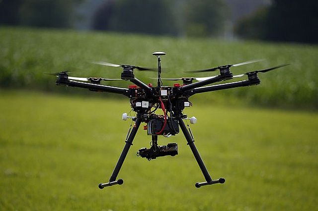A hexacopter drone is flown during a drone demonstration at a farm in Cordova, Maryland in this June 11, 2015 photo. (AP)