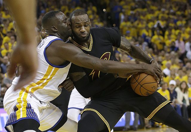 Cleveland's LeBron James drives against Draymond Green of Golden State in Game 7 of the NBA Finals.