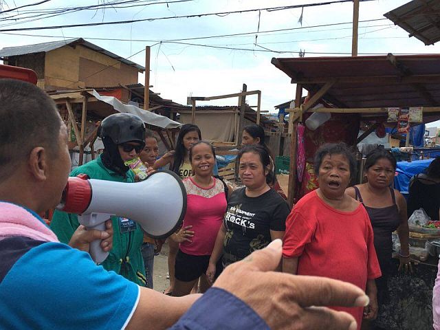 Fire victims in Barangay Guizo and Mantuyong, Mandaue City were told to voluntarily demolish the structures they have rebuilt at the fire site within three days. (CDN PHOTO/TONEE DESPOJO)