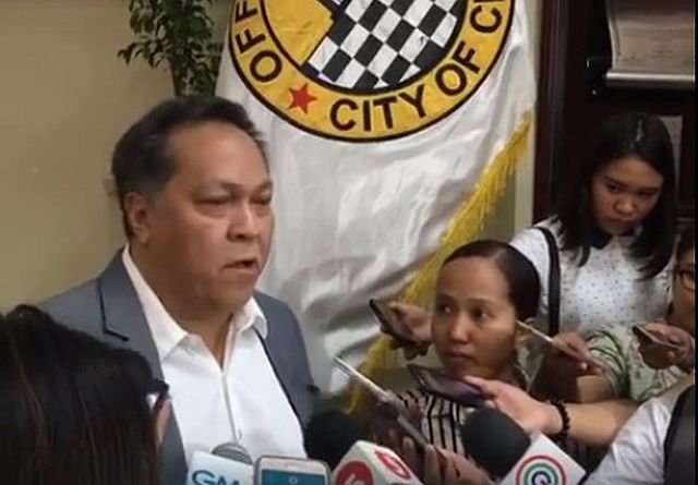 Councilor James Cuenco answers questions from the media after Wednesday morning's session where he was appointed as new committee head for Budget and Finance. (PHOTO GRABBED FROM TONEE DESPOJO'S LIVE VIDEO)