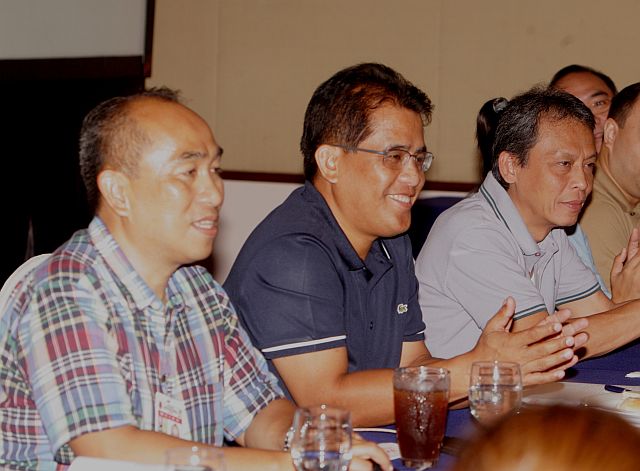 LTFRB Regional Director Ahmed Cuizon (left) briefs chairman Winston Ginez (center) and board member Ronald Corpuz on the region’s transport situation during the stakeholders forum. (CDN PHOTO/TONEE DESPOJO)