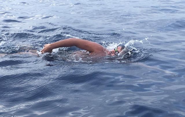 Lawyer Ingemar Macarine swims the waters off Bohol Strait  in his latest open water swim.