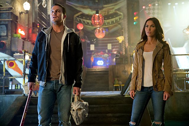 Stephen Amell as Casey Jones and Megan Fox as April O’Neil in a scene from “Teenage Mutant Ninja Turtles: Out of the Shadows”