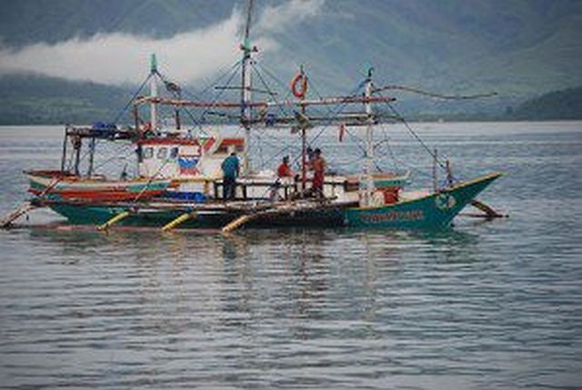 Fishermen from Subic, Zambales, prepare their boats for another fishing trip to Scarborough Shoal moments after the Permanent Court of Arbitration in The Hague favored the Philippines in its territorial dispute with China. (INQUIRER.NET) 