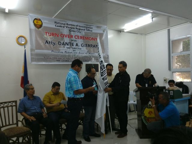NBI Director Dante Gierran (second from left) presides the turnover rites to the new NBI - 7 Director Patricio Bernales (Left most with blue polo)