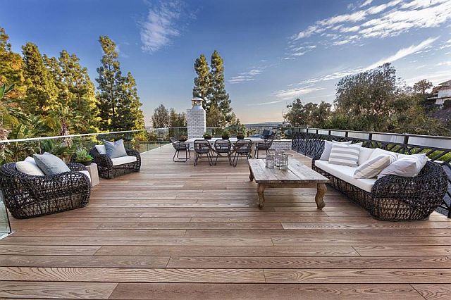 This photo  by Elle shows  Kenneth Cobonpue furniture in the rooftop deck view of  Kendall Jenner’s Hollywood home.
