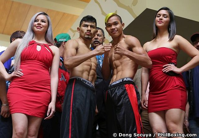Cesar Juarez of Mexico (left) and Albert Pagara flex their muscles during their weigh-in for their main event encounter of the Pinoy Pride 37: Fists of the Future today in San Mateo, California USA. DONG SECUYA/PHILBOXING.COM