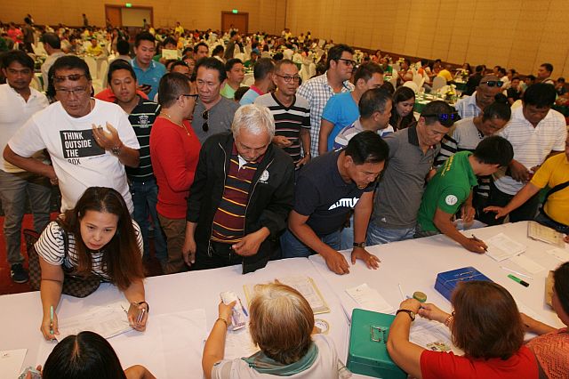 Barangay officials receive their cash incentives at the Waterfront Hotel in Lahug in this April 2016 file photo.