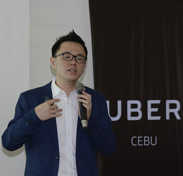 Laurence Cua, general manager of Uber Philippines, discusses in a press briefing the latest development of the American technology firm using the ride-sharing app in serving passengers. (CDN PHOTO/CHRISTIAN MANINGO)
