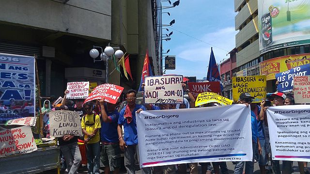 Members of militant groups staged a rally at Colon Street in Cebu City to urge President Rodrigo Duterte to address issues including the extrajudicial killings (CDN PHOTO/MICHELLE JOY L. PADAYHAG)
