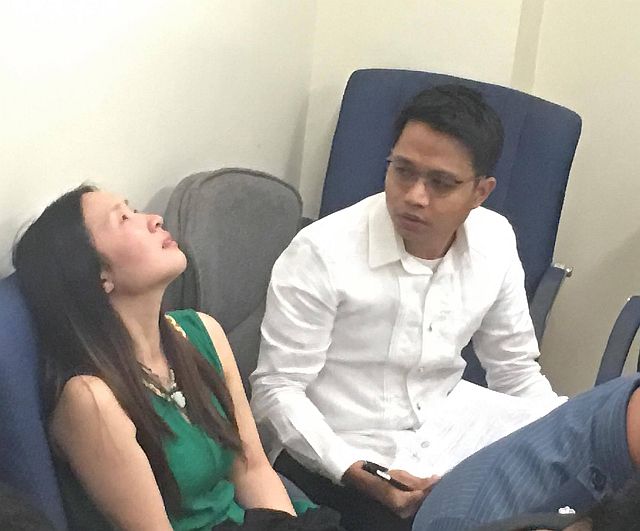 Chinese national Zhou Liming appears to ponder on her predicament as she is presented to Lapu-Lapu City Prosecutor Angelo Barrios. (CDN PHOTO/TONEE DESPOJO)