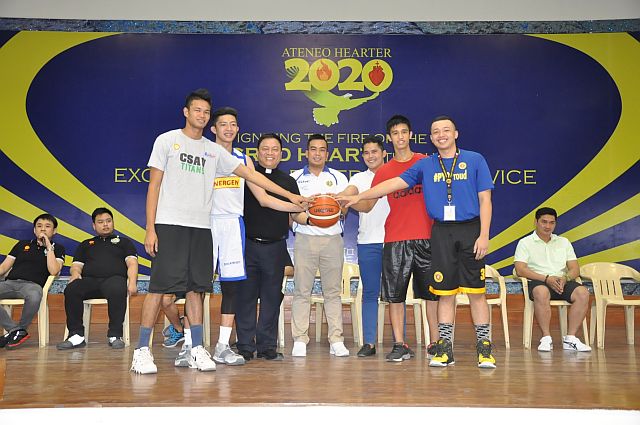 Fr. Manny Uy, S.J. (SHS-Ateneo de Cebu President), commissioner Jerry Abuyabor and Mark Ynoc of San Remigio Properties lead the Pledge of Unity along with the team captains of the different teams. (CONTRIBUTED)