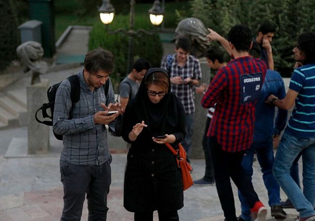 Iranians play Pokemon Go app in northern Tehran’s Mellat Park.