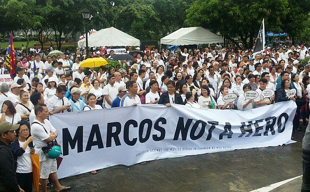 Martial law victims, lawmakers, artists, civil society groups, religious groups, students and concerned citizens gather on a rainy Sunday morning at the Luneta Park in Manila to appeal to President Rodrigo Duterte to reconsider his decision to allow the burial of late dictator Ferdinand Marcos at the Libingan ng mga Bayani. (INQUIRER.NET) 