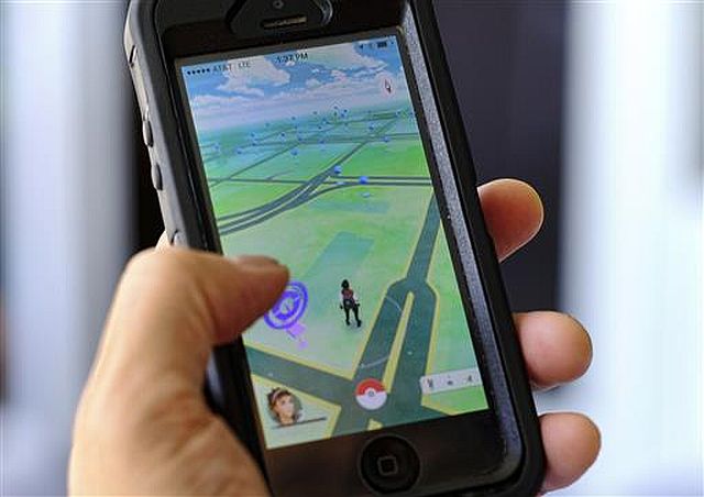“Pokémon Go” is displayed on a cellphone in Los Angeles. Pokémon Go’s origins are as peculiar as any of the creatures inhabiting the game. (AP)
