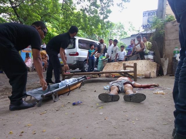Edward Cassil was gunned down by motorcycle riding gunmen at Sitio Kawayan, Barangay Kamputhaw near LBC Gorordo corner Archbishop Reyes (CDN PHOTO/Junjie Mendoza)