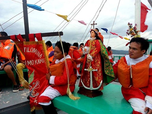 WONDER WORKER. The image  of St. Filomena on board the sea vessel for the religious activity. There are  no concrete historical accounts, but  according to storied apparitions,  Filomena (or Philomena) was born to a royal family. She was a 13-year-old girl who was tortured when she refused to  renounce Christ and refused to marry a pagan emperor. Her prominent attributes are an arrow and an anchor tied around her neck, emblems of her bravery. (CDN PHOTO/CLINT HOLTON POTESTAS)