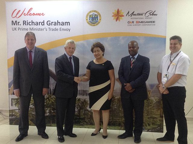 British Embassy Director for Trade and Investment Mike Moon (left) and British Trade Envoy Richard Graham (second from left) are welcomed by Lapu-Lapu City Mayor Paz Radaza (3rd from left) and GMR Megawide Chief Executive Advisor Andrew Acquaah Harrison at the Mactan Cebu International Airport during the British officials visit to Cebu last Firday (CDN PHOTO/DOMINIC YASAY).