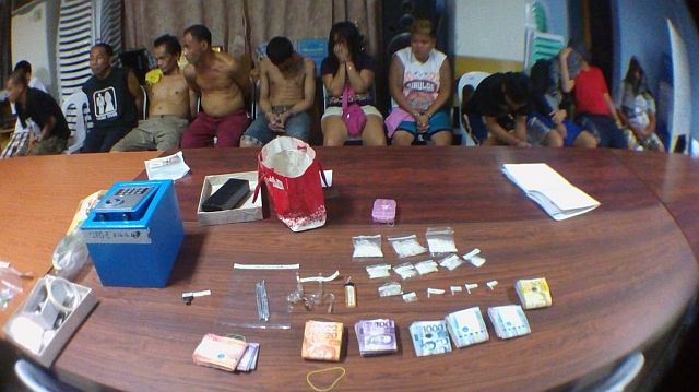 CCPO arrested 13 suspected drug pushers and drug users in an operation in Barangay Duljo-Fatima on Friday night. (CDN PHOTO/LITO TECSON)