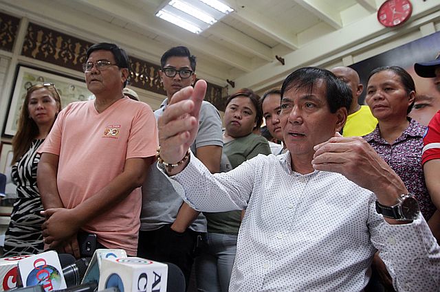 Former Cebu City Mayor Michael Rama is accompanied by  supporters during a press conference where he vehemently denied being involved in illegal drugs after his name was included in President Duterte’s list of illegal drug protectors. (CDN PHOTO/TONEE DESPOJO)