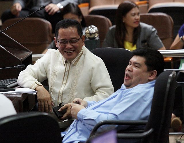 Councilor David Tumulak (left) shares a light moment with Councilor Hanz Abella in yesterday’s City Council session where he again pushed for the total  ban on the manufacture, sale and distribution of  butane-refilled canisters. (CDN PHOTO/JUNJIE MENDOZA)