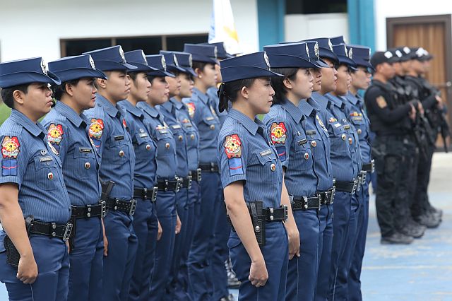 Young members of the Philippine National Police (PNP) stand at attention during a  program celebrating the 145th Police Service Anniversary. (CDN PHOTO/JUNJIE MENDOZA) 