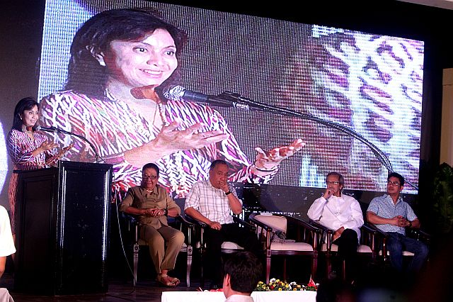 Vice President Leni Robredo speaks before local government officials and other participants present during the DevTalks. With her on stage are (from left) Vice Gov. Agnes Magpale, Gov. Hilario Davide lll and RAFI president Roberto Aboitiz. (CDN PHOTO/TONEE DESPOJO)